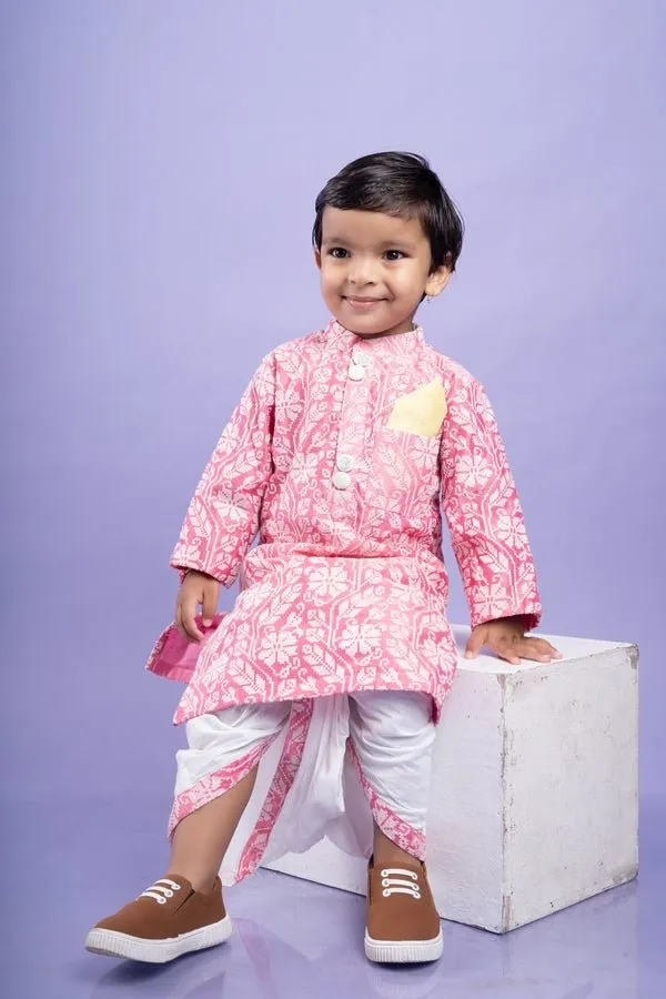 Pink and white floral kurta with classic white dhoti pants, a festive favorite for little ones