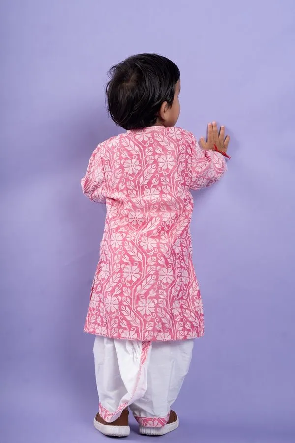 Pink and white floral kurta with classic white dhoti pants, a festive favorite for little ones